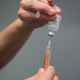 A dose of the Oxford/AstraZeneca covid-19 vaccine being prepared for use.